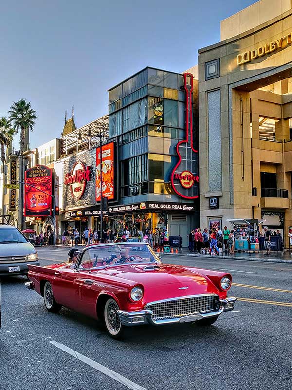 Car cruising Hollywood Walk of Fame Hollywood Blvd.