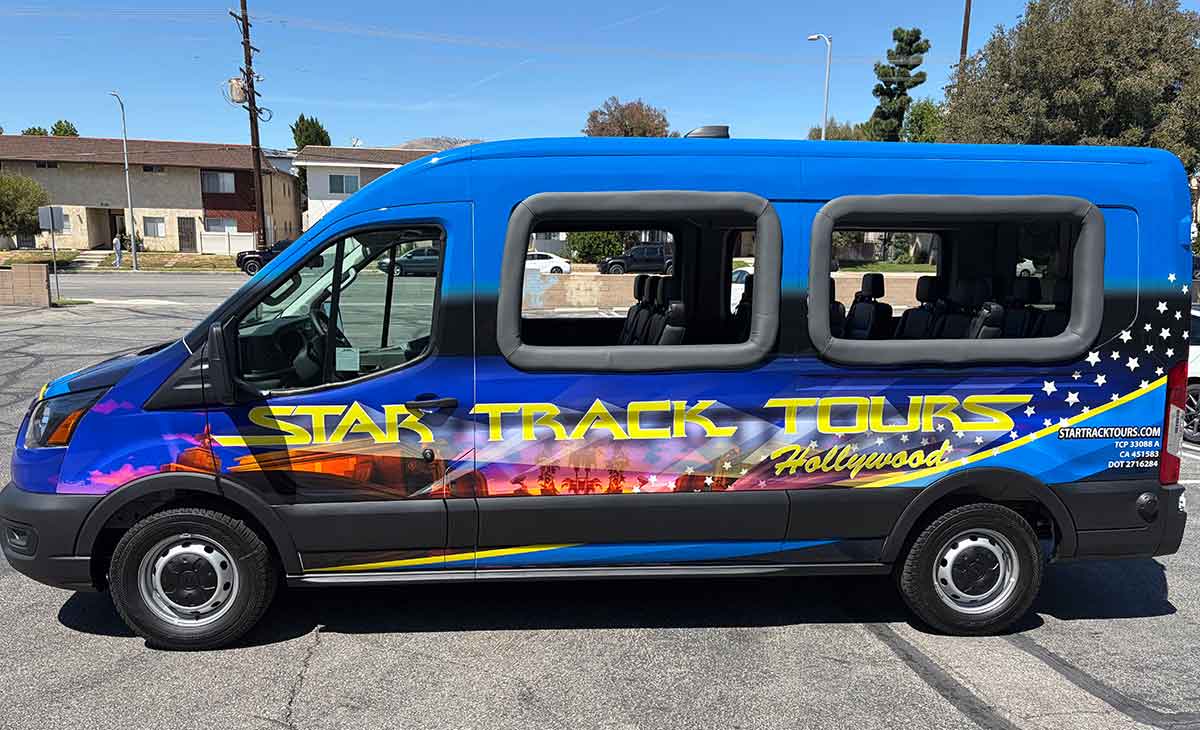 Luxury Hollywood tour bus side view